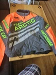 Arctic Cat Men's Sno-cross Uninsulated Snowmobile Jacket Green Orange. Fixed Price $190.00.